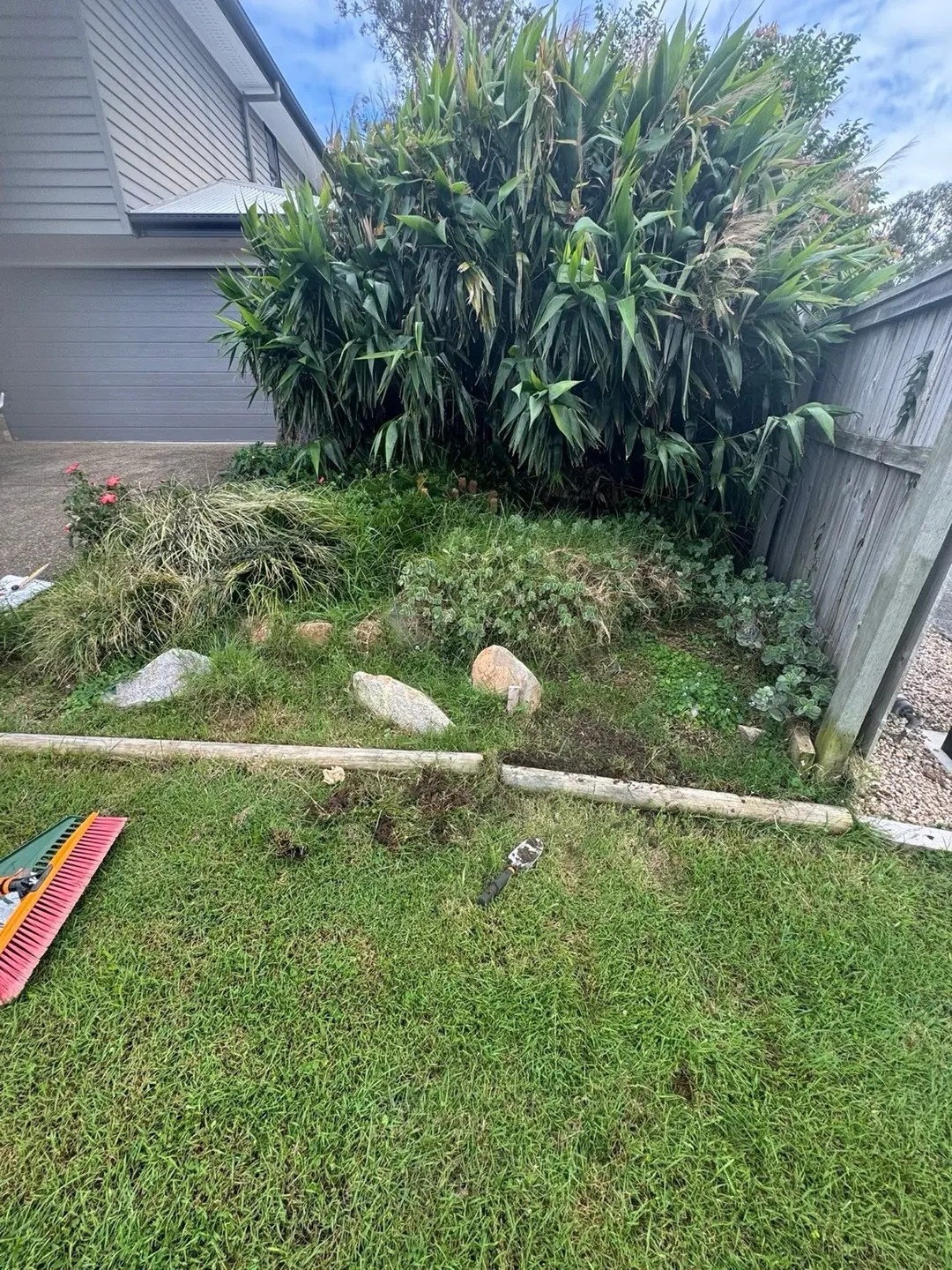 Before — garden bed cleanup by Greenstone Outdoor Solutions