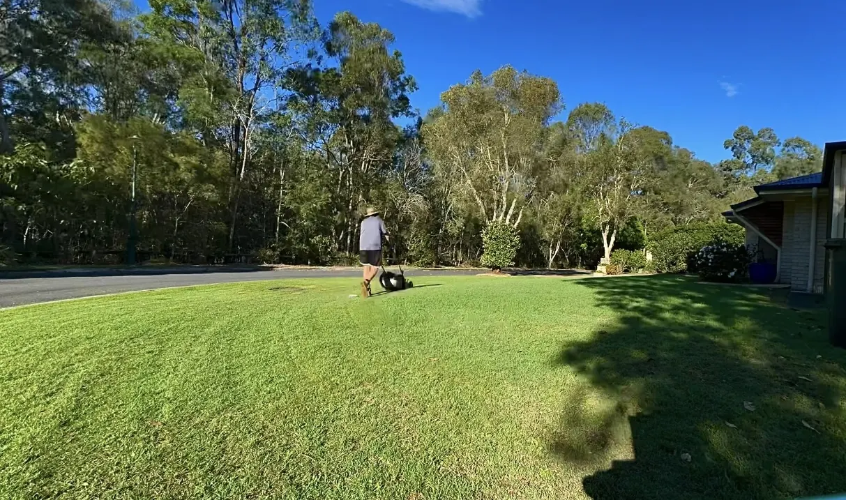 Lawn mowing service for a residential property in Logan, Queensland