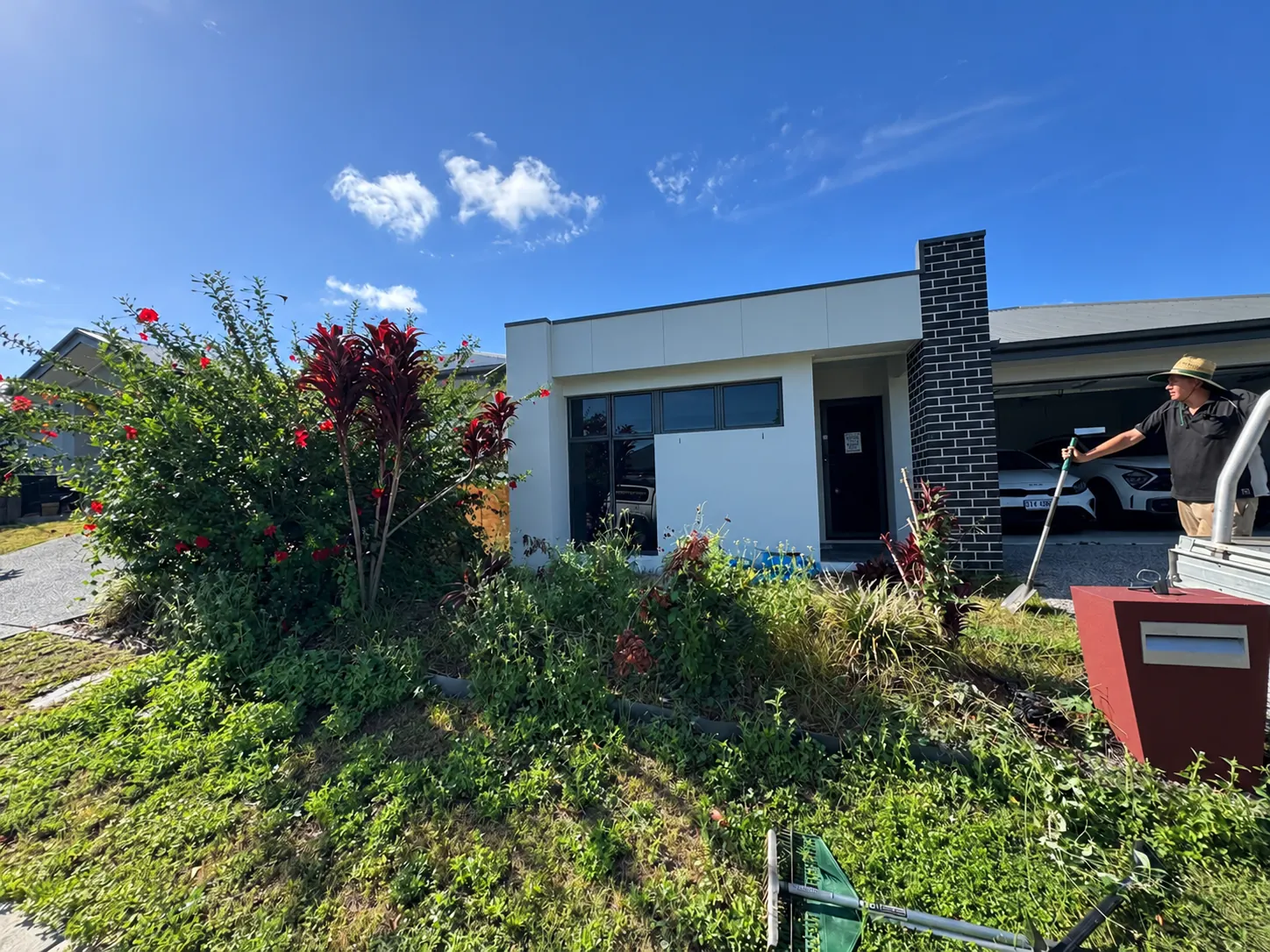 Before landscaping and outdoor improvements at a residential front garden